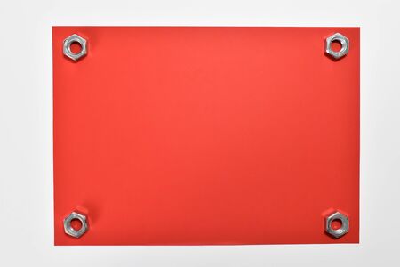 Red sheet of paper and cap.の写真素材