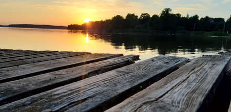 Old, wooden pier by the lake.の写真素材