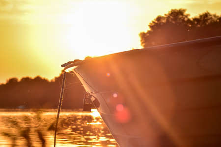 Colorful sunsets over the water.