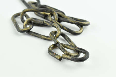 Thick metal chain on different backgrounds.