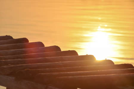 Old, wooden pier over the lake.の写真素材