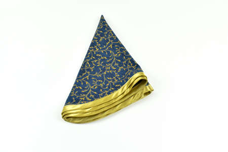Thick, folded fabric on a light background.の写真素材