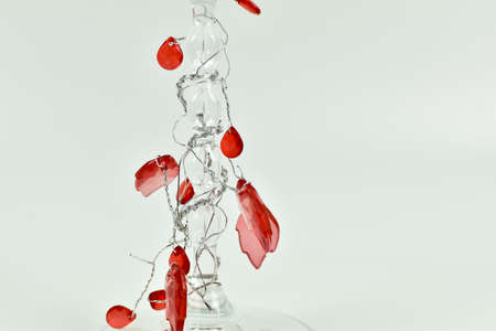 Red and bright crystals on a white background.の写真素材
