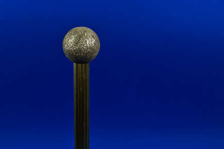 Metal profiles and Christmas baubles.の写真素材