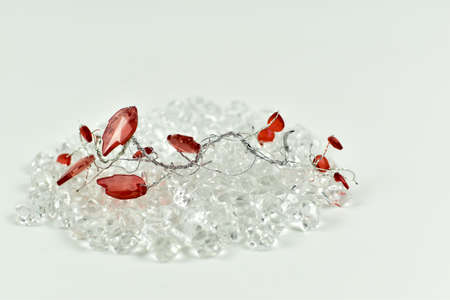 Red and bright crystals on a white background.の写真素材