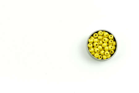 Colorful wooden beads and metal rings.