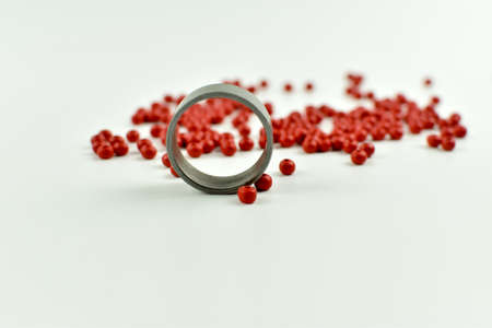 Colorful wooden beads and metal rings.の写真素材