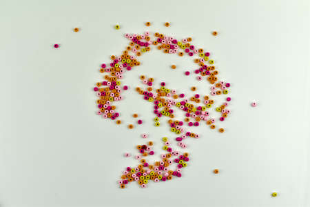 Colorful wooden beads on different backgroundsの写真素材