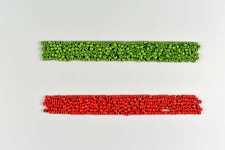 Colorful wooden beads on different backgroundsの写真素材
