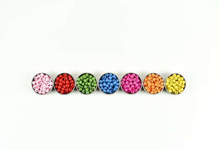 Colorful wooden beads and metal rings.の写真素材