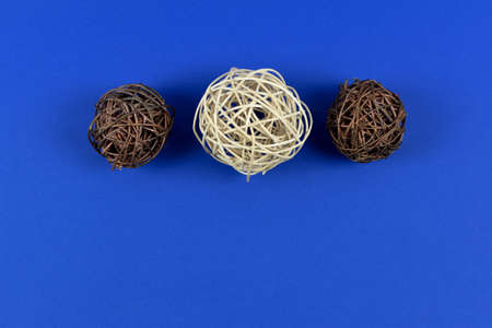 colorful wicker balls on different backgrounds.の写真素材