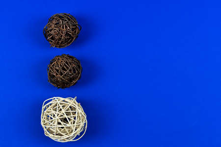 colorful wicker balls on different backgrounds.の写真素材