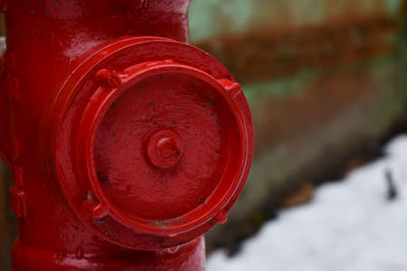Red fire hydrant in winter. Red fire hydrant close-up.の写真素材