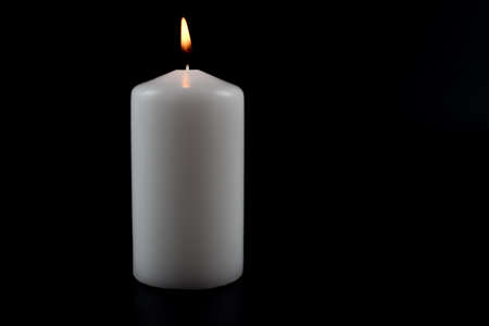 Candle on black background with space for text. 3d renderingの写真素材