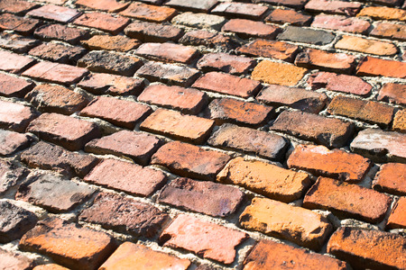 a wall built of red bricksの写真素材