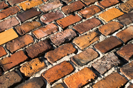 a wall built of red bricksの写真素材