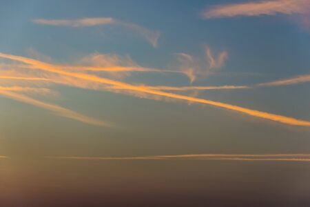 Beautiful aerial view above clouds with sunset