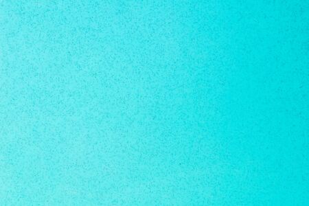 light blue plastic with dark spots.の写真素材