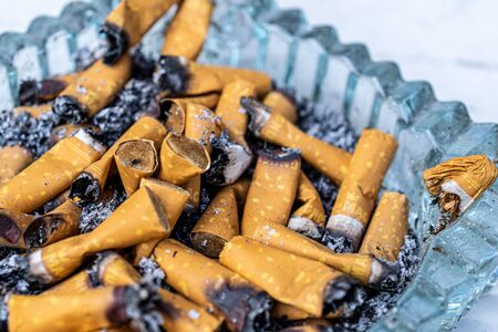 cigarette filters in the ashtray.の写真素材