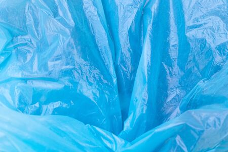 blue thin wrinkled foil texture.の写真素材