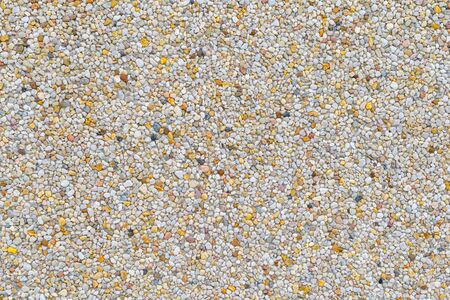 brown wall texture. small pebbles.の写真素材