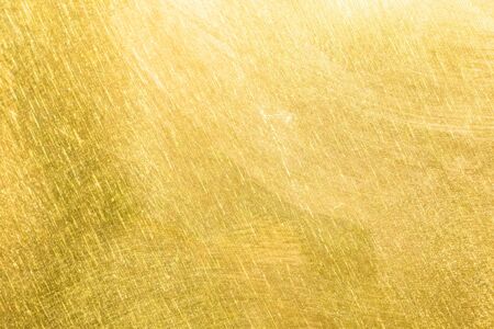 metal painted golden color texture or backgroundの写真素材