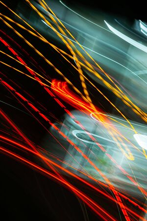 Black background with multicolored luminous lines