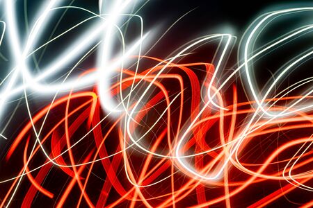 Black background with multicolored luminous lines