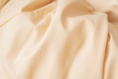 creased creamy material texture or backgroundの写真素材