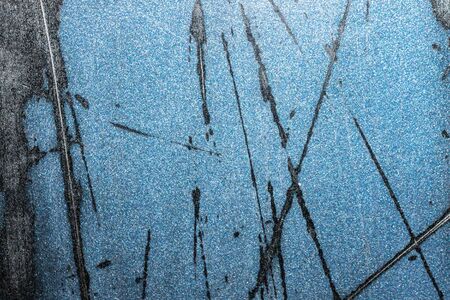 old metal painted with blue paintの写真素材