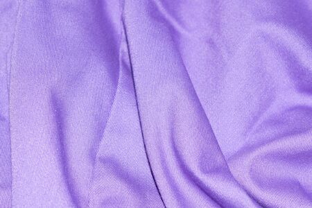 creased purple material texture or background.の写真素材