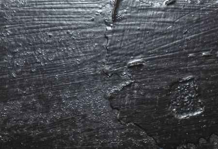 old metal sheet painted with black paint.の写真素材
