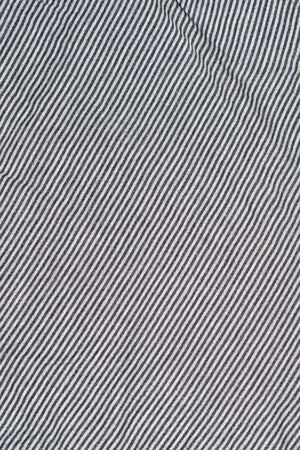 creased white fabric with gray stripes.の写真素材