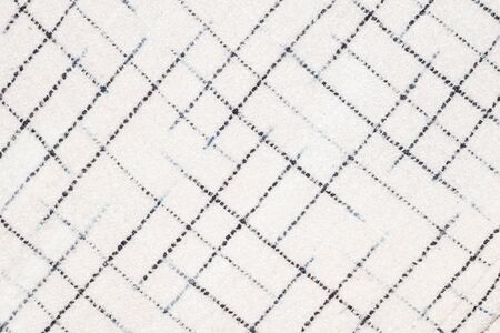 white fabric with black lines