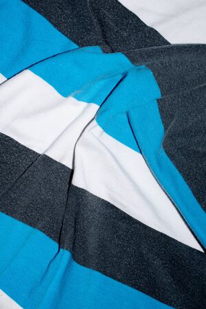 striped background made of fabric and textiles blue and white and black color.の写真素材