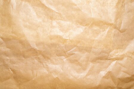 crinkled brown sheet of paper.の写真素材