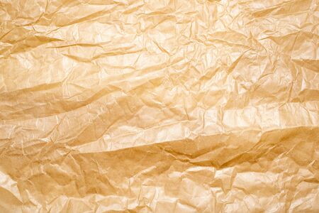 crinkled brown sheet of paper.の写真素材