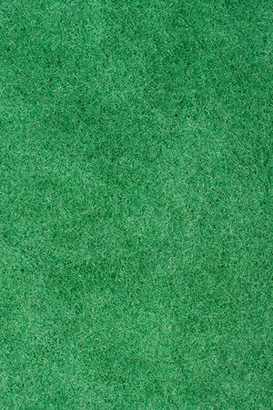 green sponge for washing dishes texture or backgroundの写真素材