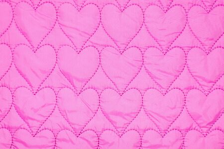 pink fabric with hearts texture or background