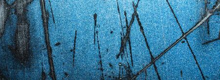 old metal painted with blue paintの写真素材