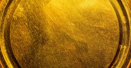metal painted golden color texture or backgroundの写真素材