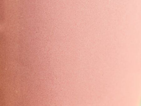 Texture of old coral paper background, closeup.の写真素材
