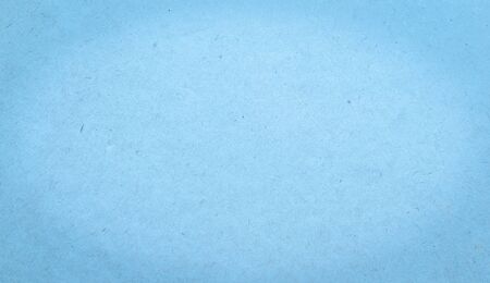 blue sheet of paper with visible textureの写真素材