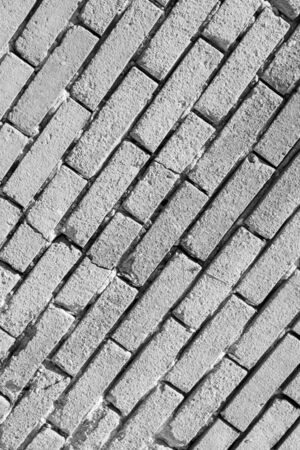 photo of a brick wall .black and white