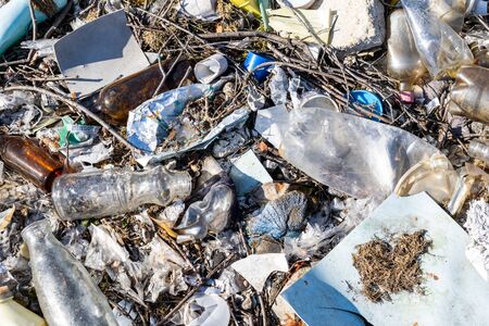 Municipal garbage dump in landfill. Environmental pollution.