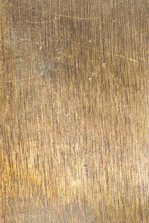 old brass sheet with visible details. texturaの写真素材