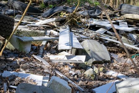 Municipal garbage dump in landfill. Environmental pollution.の写真素材
