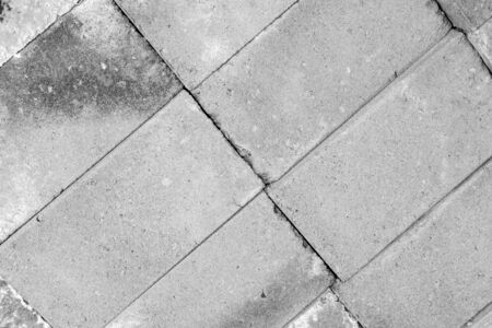 gray concrete blocks with visible details. texture or backgroundの写真素材