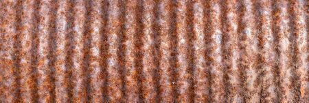 old rusty metal sheet with lines. texture or backgroundの写真素材