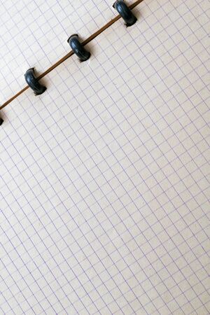 old page from a checkered notebook. texture or backgroundの写真素材